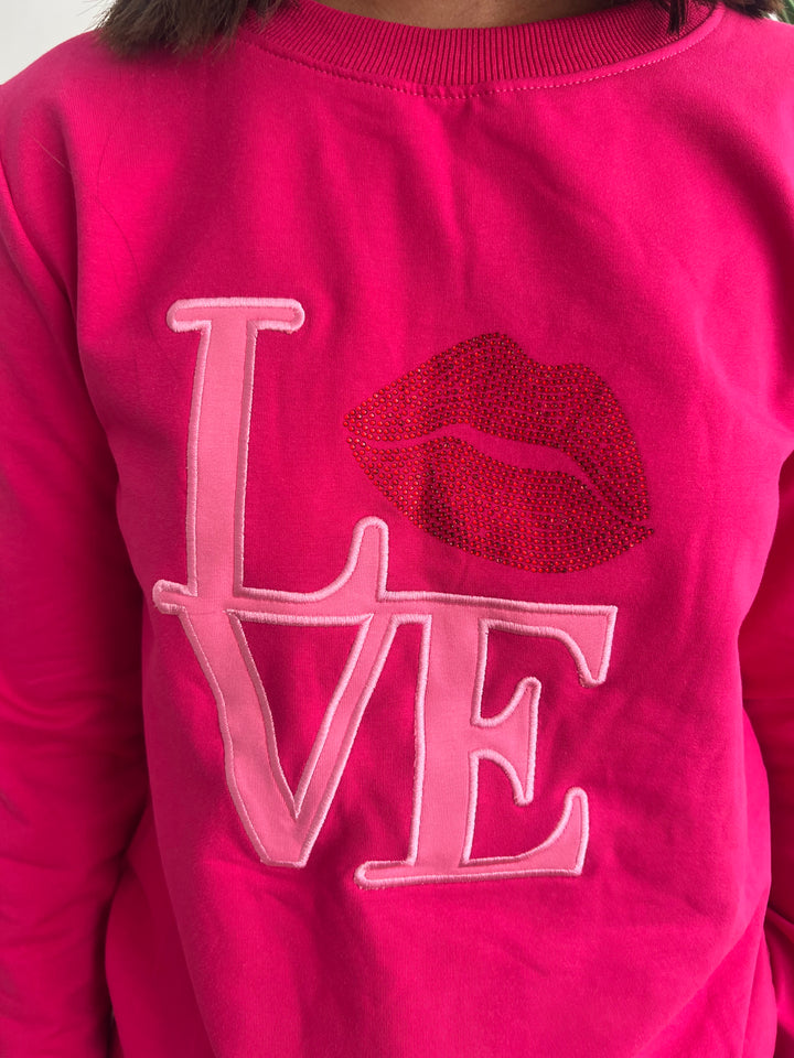 Sudadera Kiss fucsia
