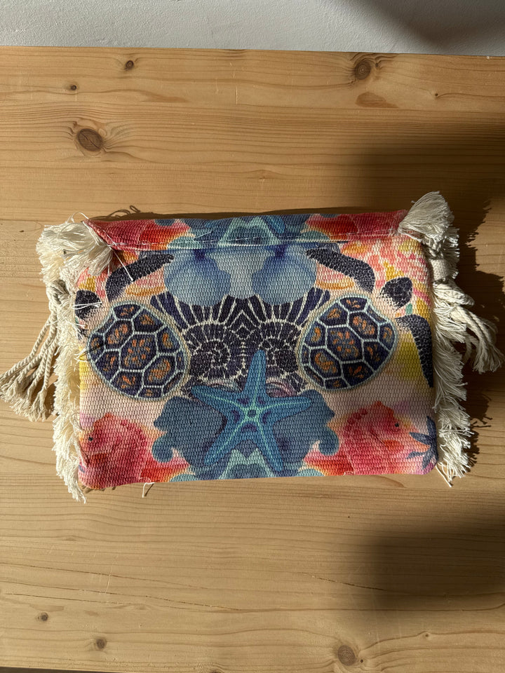 Bolso flecos tortugas
