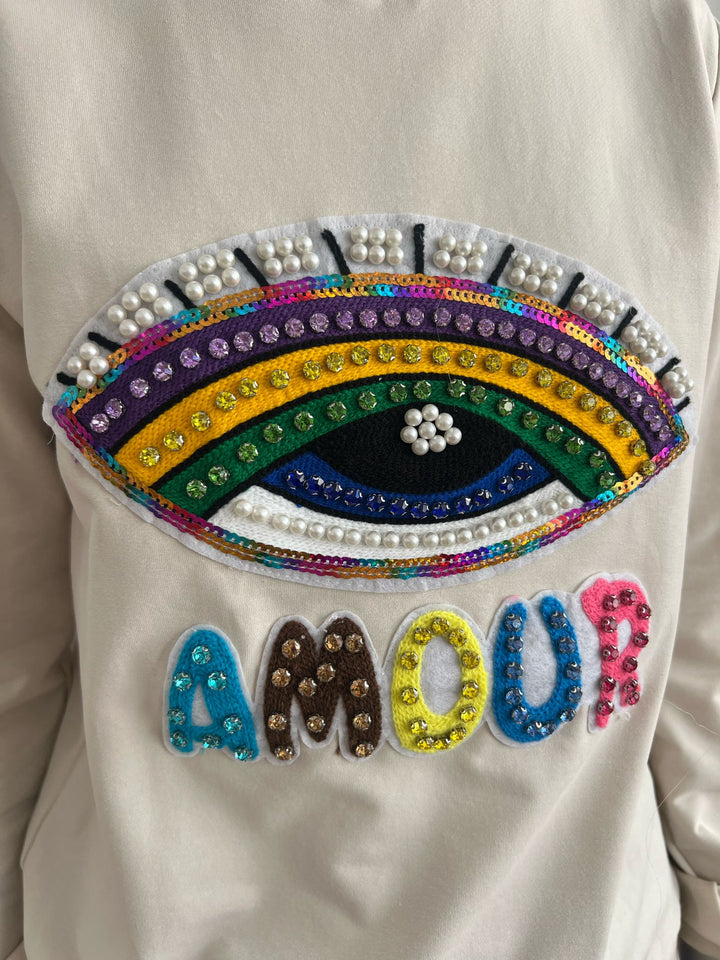 Sudadera Ojo beige